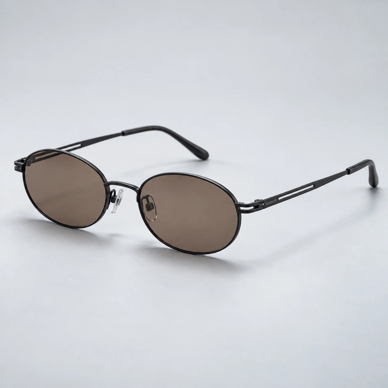 Circuit Oval, Black frame with brown gray lenses